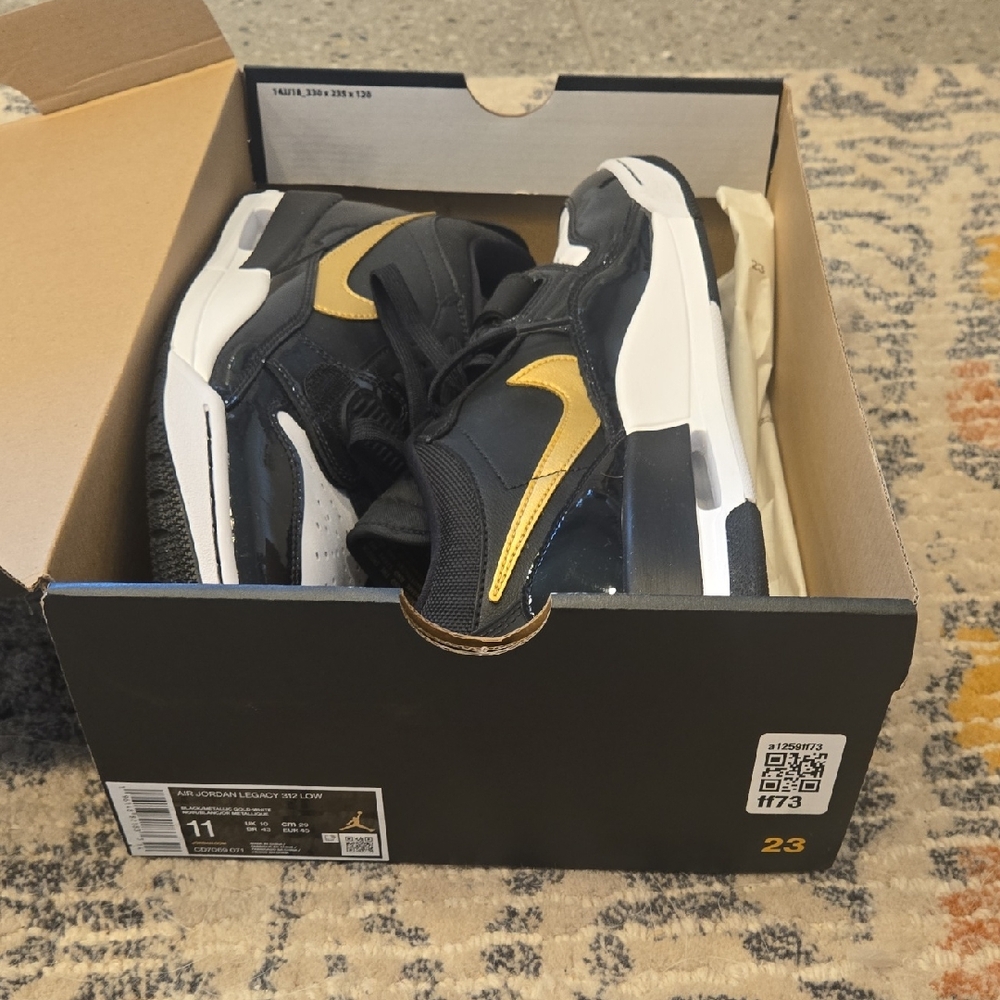 Nike Black and Gold Sneakers Modern Design